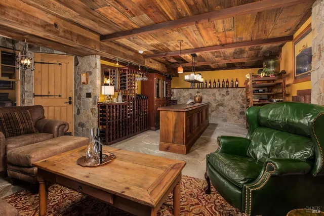 a bathroom with a sink mirror and shower