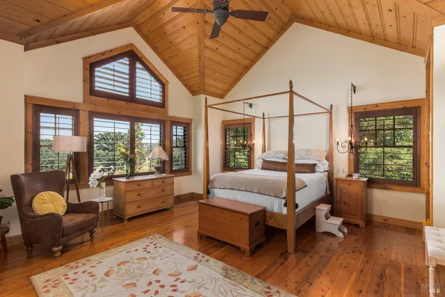 a bathroom with a sink double vanity granite and a mirror