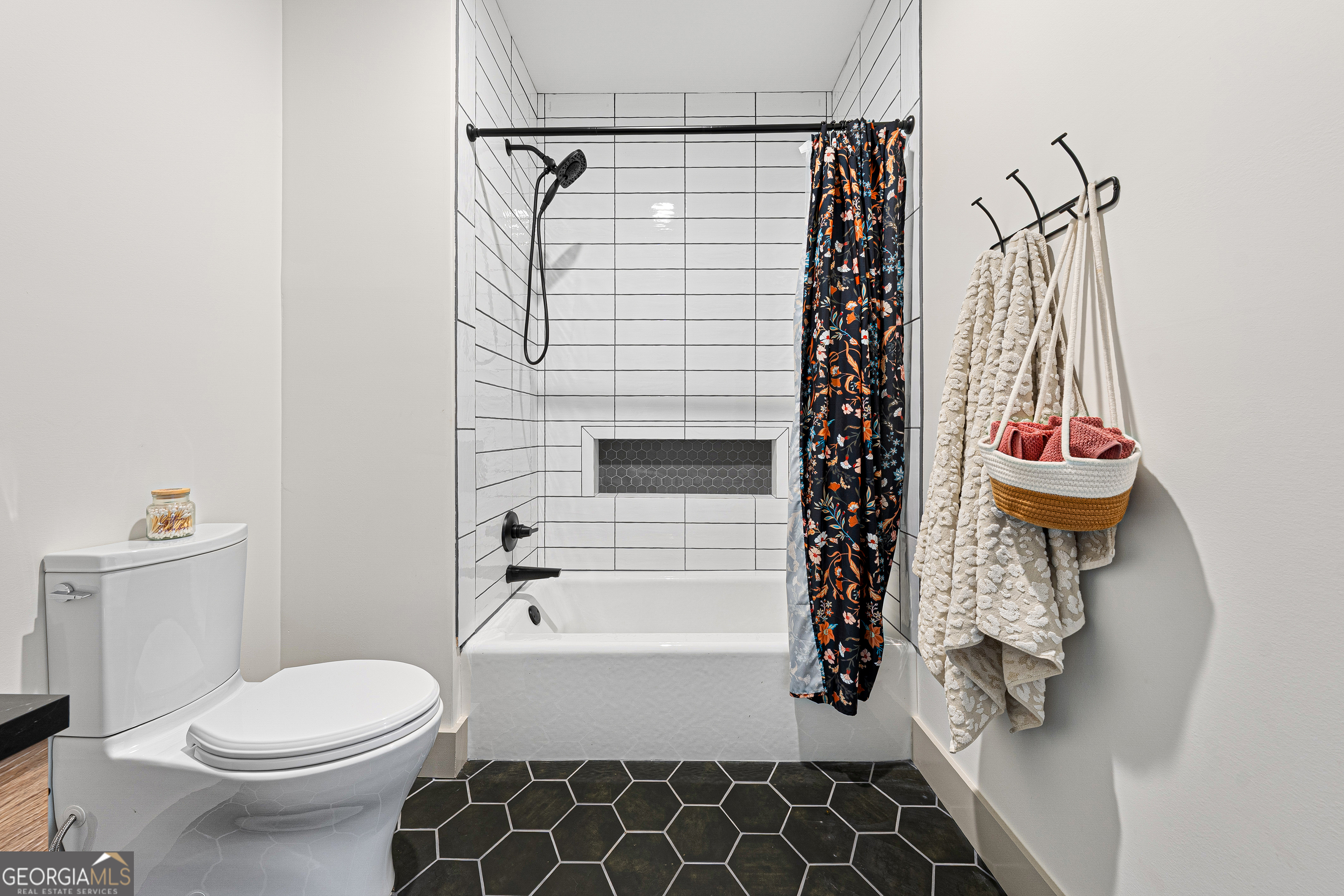 630 Human Road Bowman, GA 30624 - Photo 21 of 36 a bathroom with a toilet and a shower