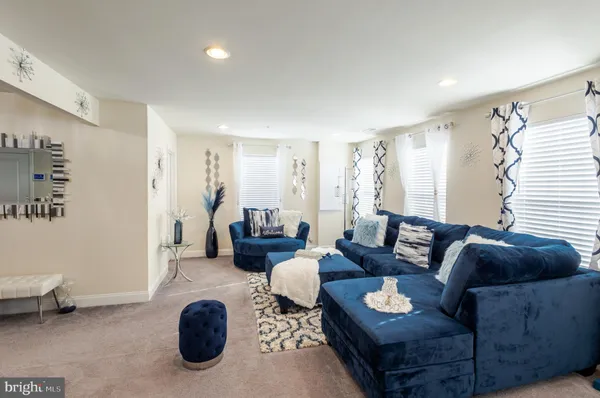 a living room with furniture and a couch