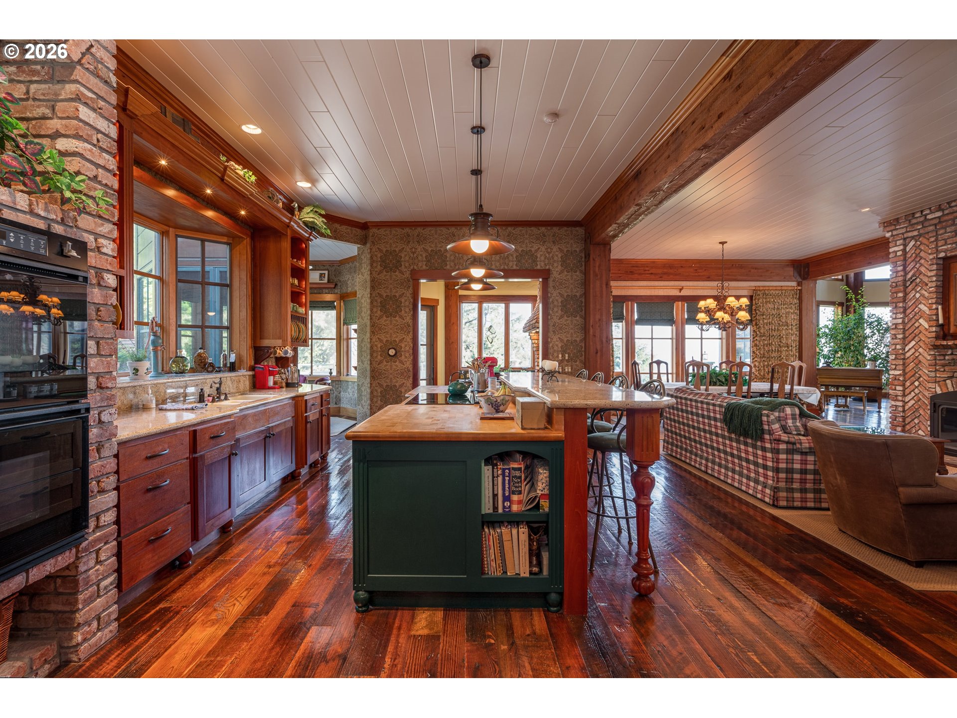 36044 Highway 101 Gold Beach, OR 97444 - Photo 12 of 43 a kitchen with stainless steel appliances granite countertop a sink a stove and a wooden floors