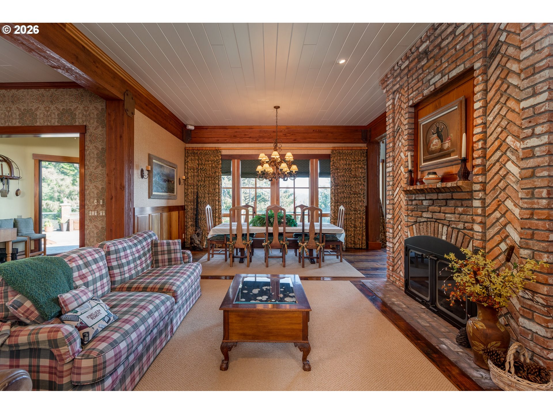 36044 Highway 101 Gold Beach, OR 97444 - Photo 17 of 43 a outdoor living space with furniture and a fireplace