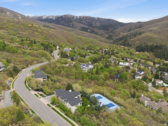 1878 East Ridge Point Drive Bountiful, UT 84010 - Photo 81 of 92 Aerial view of property's location featuring nearby suburban area and a mountain backdrop