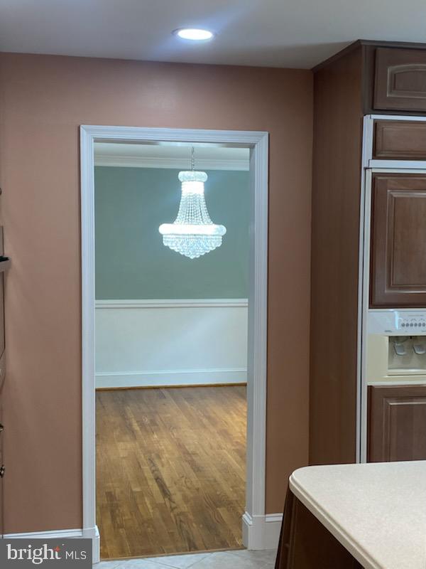 14705 Notley Road Silver Spring, MD 20905 - Photo 36 of 44 Charming entryway with elegant lighting.