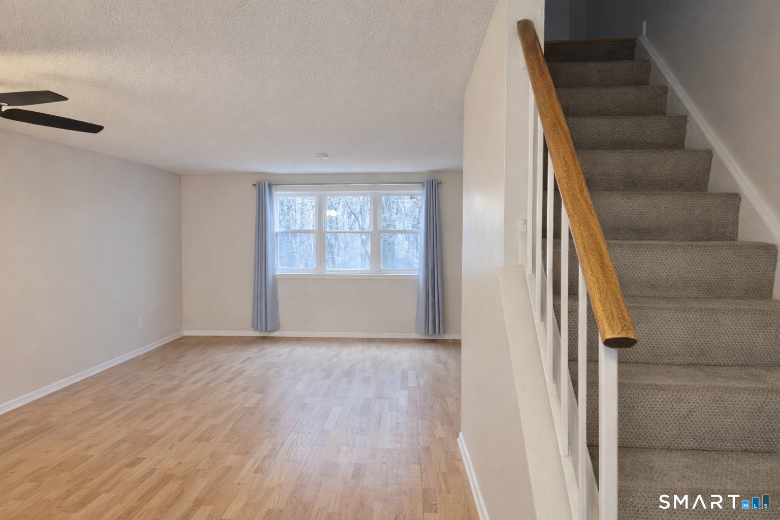 144 East Gate Lane, Unit 144 Hamden, CT 06514 - Photo 12 of 33 a view of wooden floor and entryway in a room