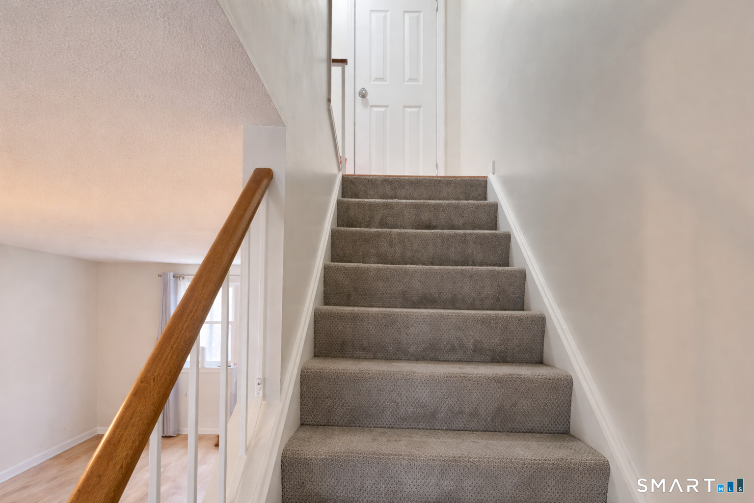 144 East Gate Lane, Unit 144 Hamden, CT 06514 - Photo 19 of 33 a view of staircase with white walls