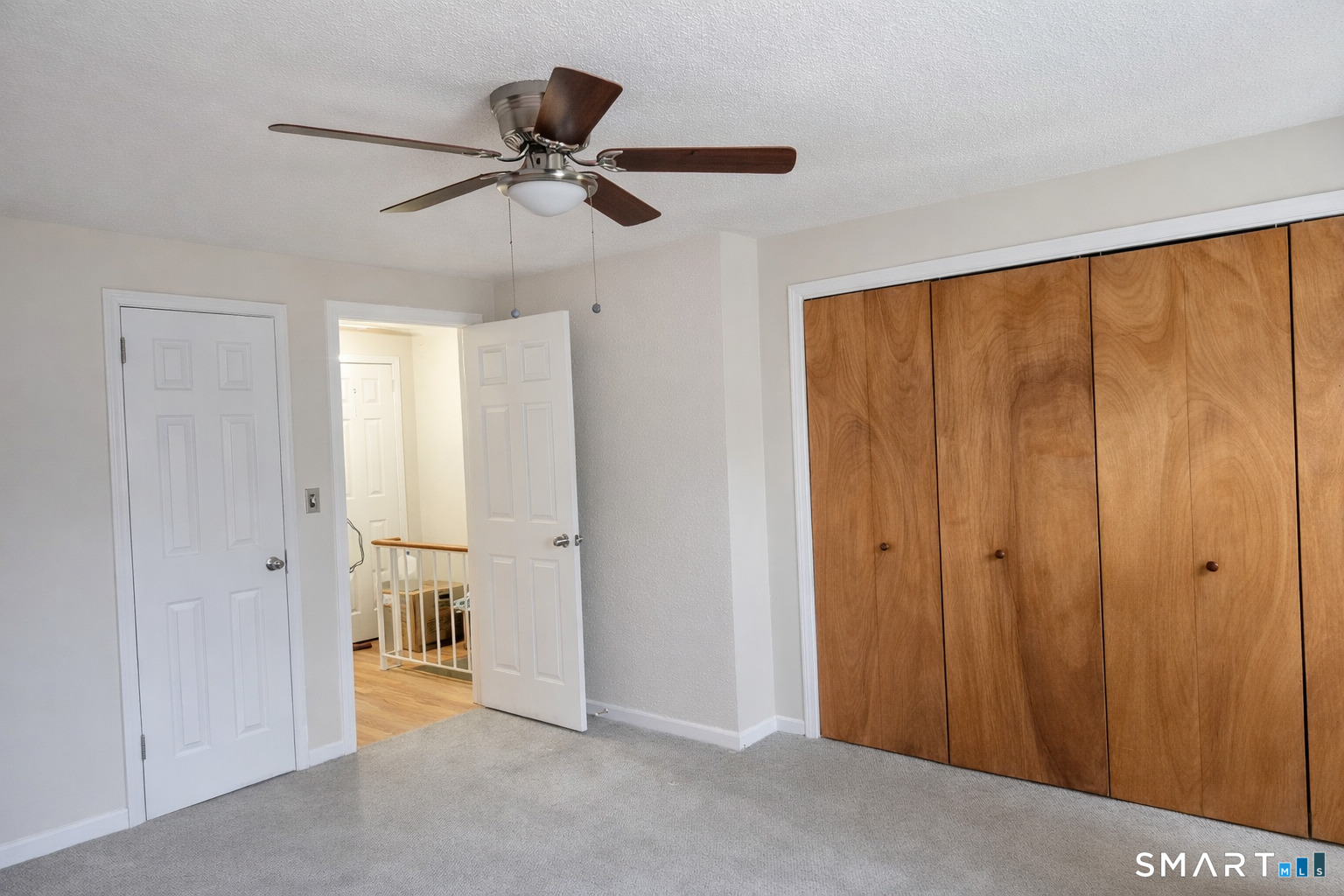144 East Gate Lane, Unit 144 Hamden, CT 06514 - Photo 22 of 33 a view of a room with a ceiling fan