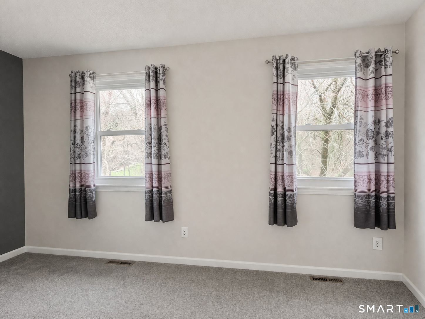 144 East Gate Lane, Unit 144 Hamden, CT 06514 - Photo 24 of 33 a view of walk in closet with windows