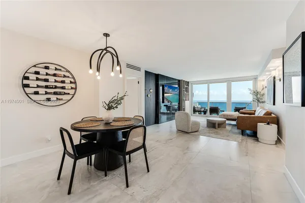 a view of a livingroom with furniture and window