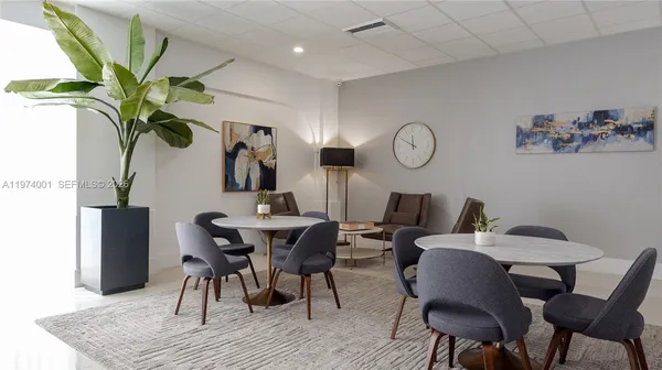 a view of a dining room with furniture