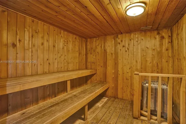 a view of a balcony with wooden floor