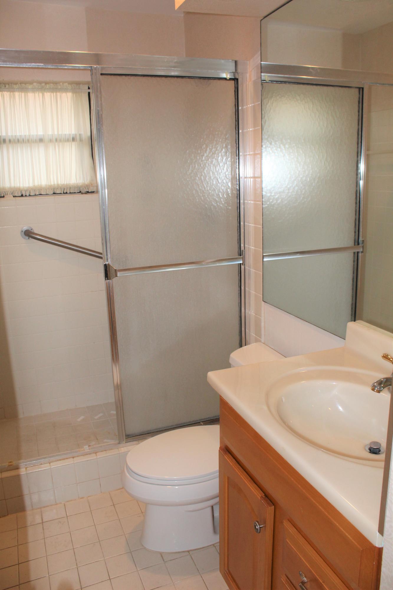 4655 Laurel Tree Road, Unit B Boynton Beach, FL 33436 - Photo 13 of 26 Guest Bathroom