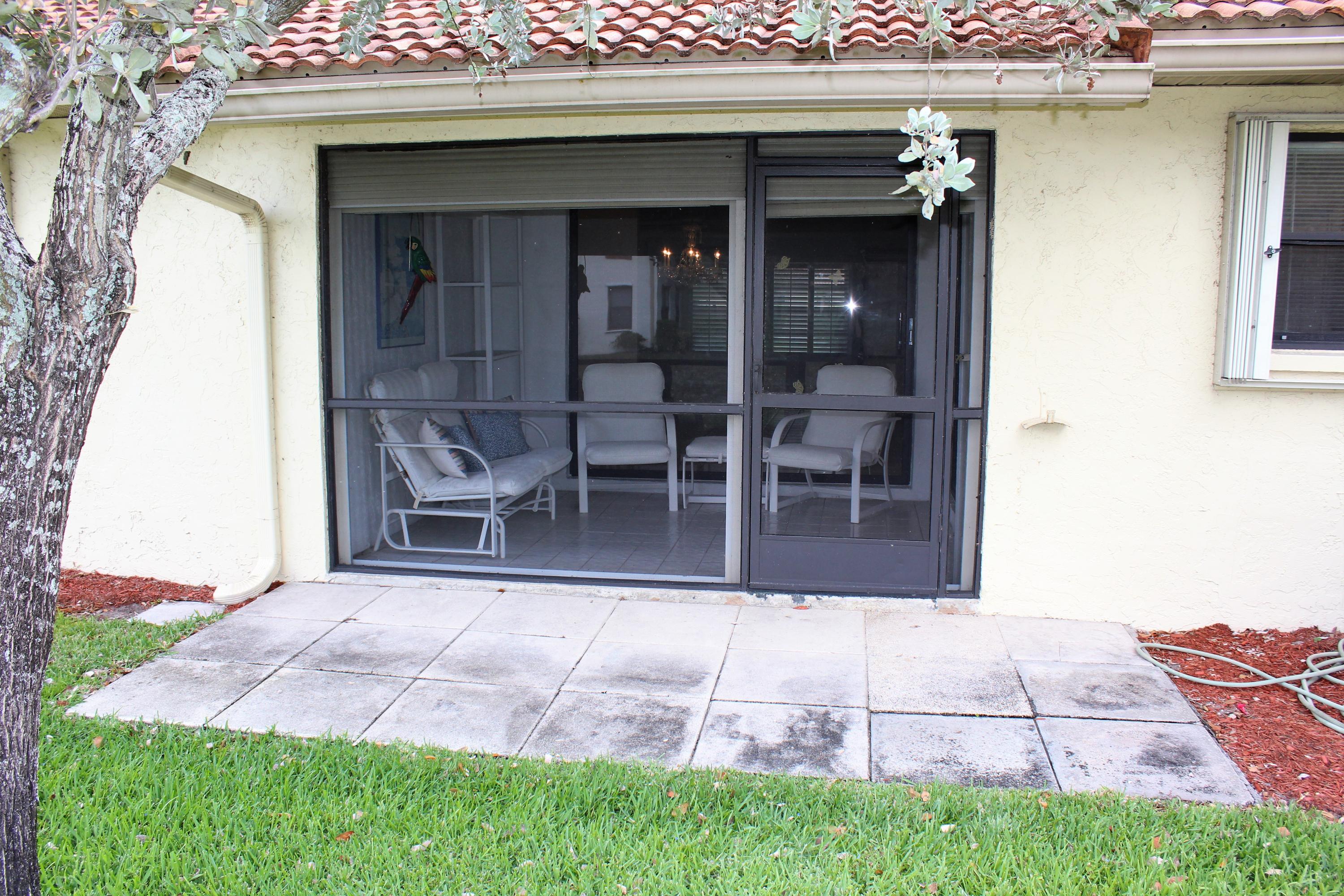 4655 Laurel Tree Road, Unit B Boynton Beach, FL 33436 - Photo 14 of 26 Back Patio