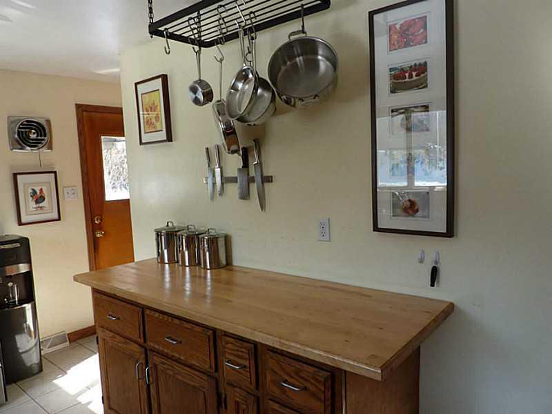 1823 Ridge Avenue Coraopolis, PA 15108 - Photo 3 of 18 Kitchen. Kitchen work station. Pots do not stay but the holder suspended for the ceiling does!