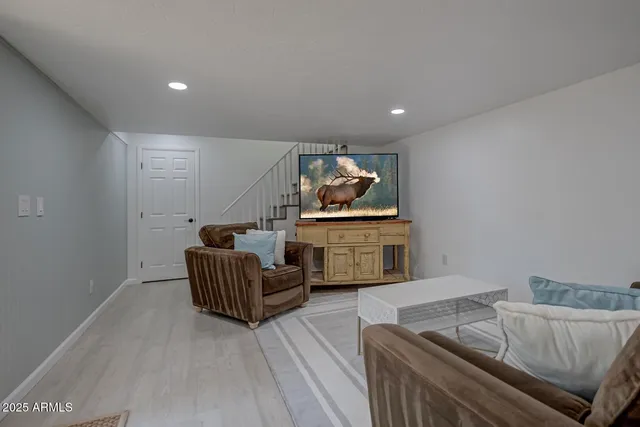 a living room with furniture and a couch