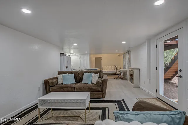 a living room with furniture and a couch