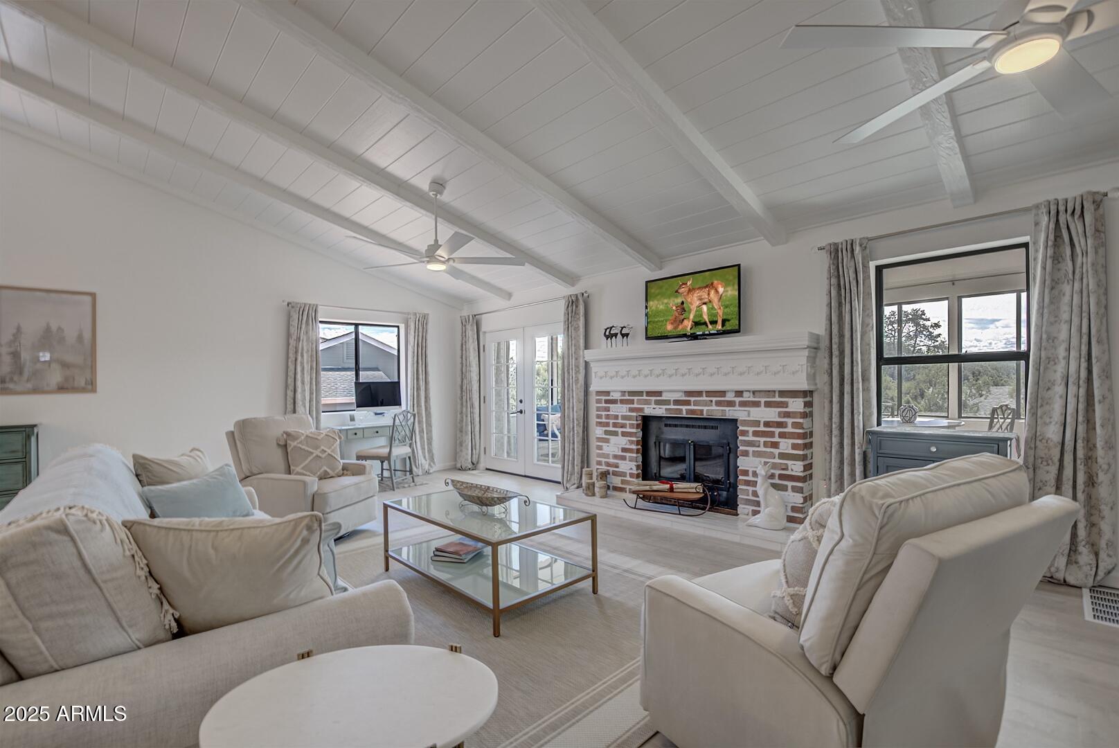 1303 North Sunshine Lane Payson, AZ 85541 - Photo 6 of 29 a living room with furniture fireplace and window