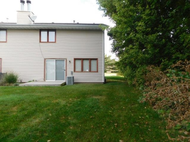 7329 Travertine Trail Rockford, IL 61107 - Photo 17 of 17 a front view of a house with a yard