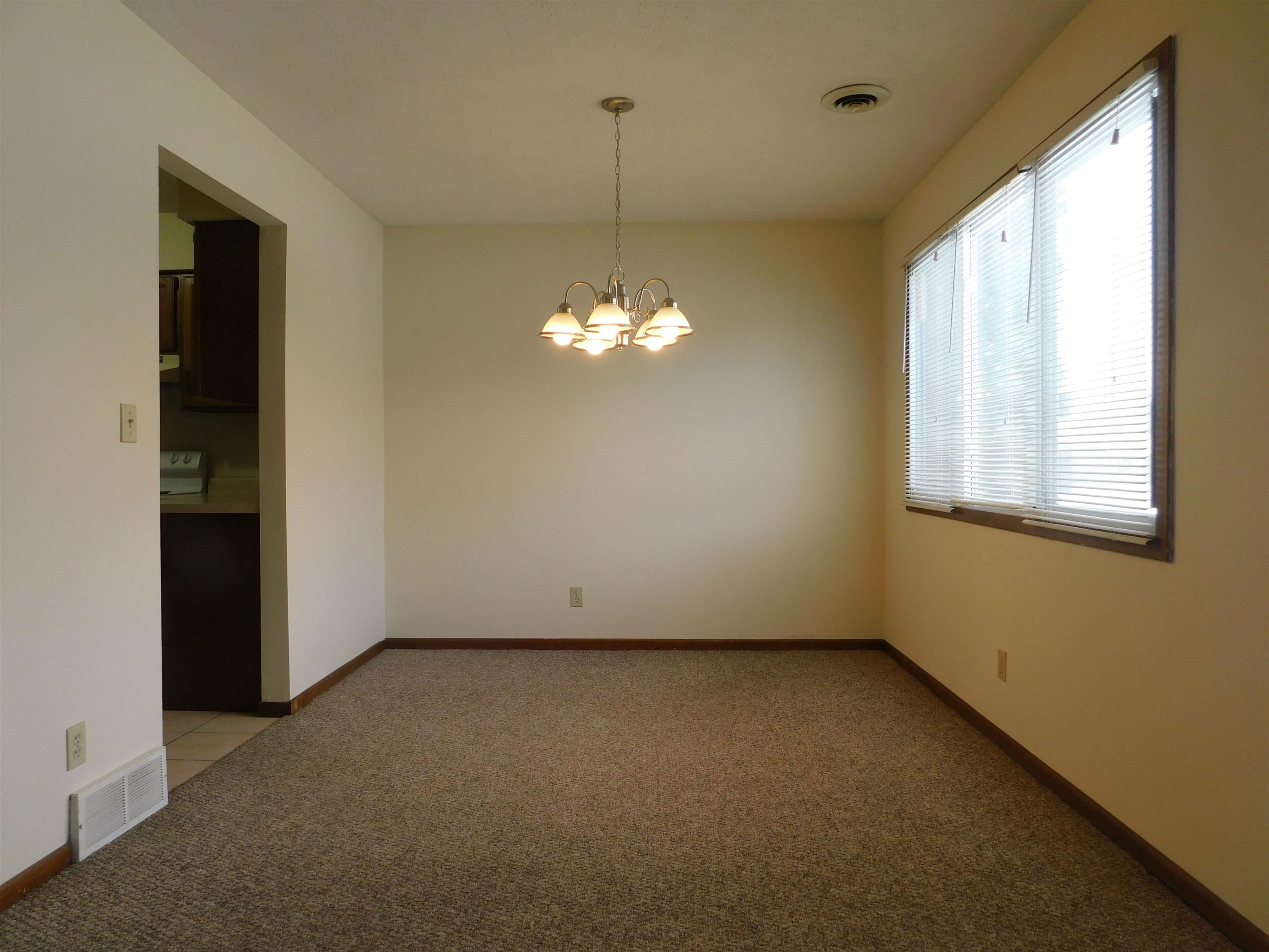 7329 Travertine Trail Rockford, IL 61107 - Photo 6 of 17 a view of a room with a large window
