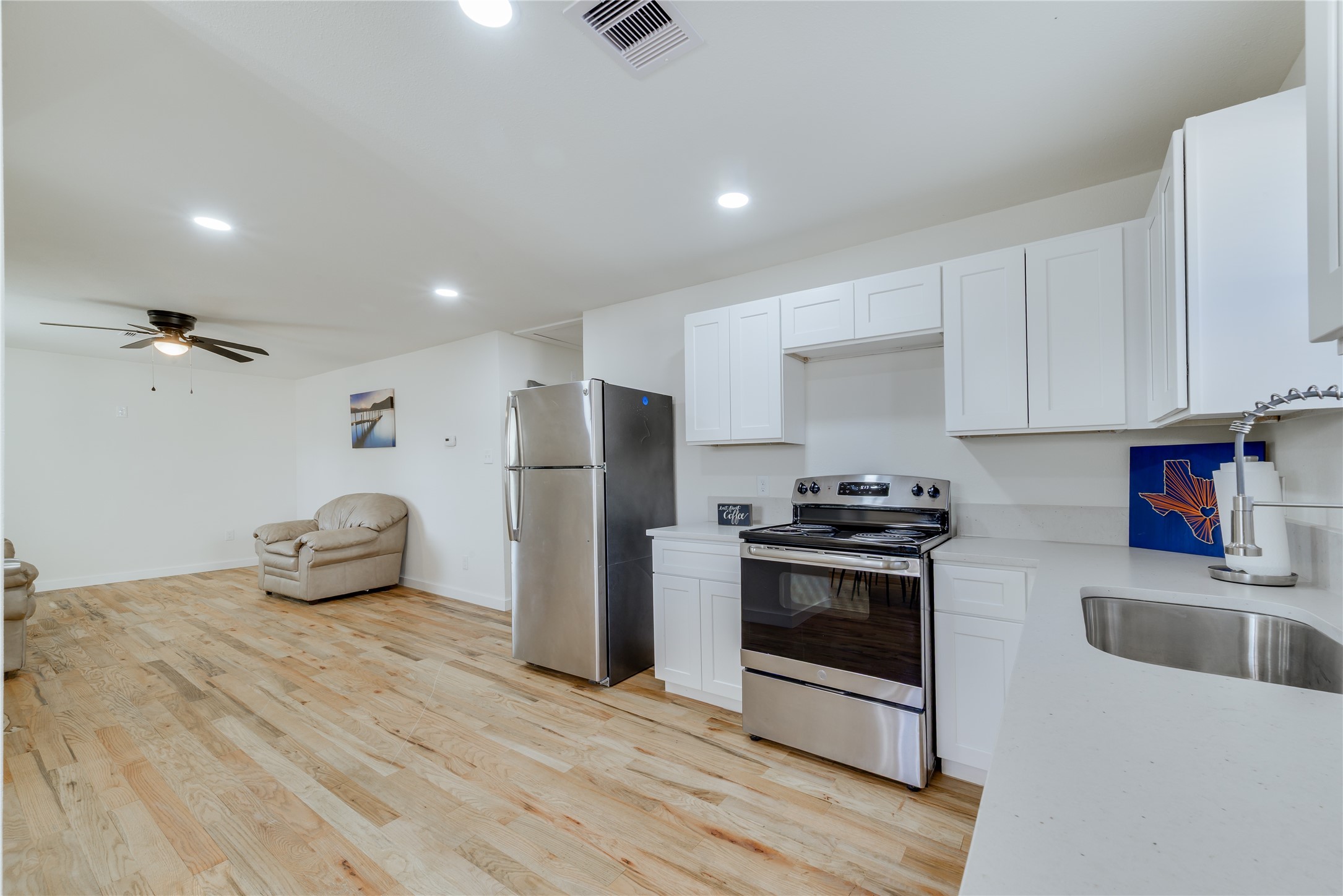 6603 Victoria Street Houston, TX 77020 - Photo 13 of 34 a kitchen with stainless steel appliances granite countertop a refrigerator and a stove