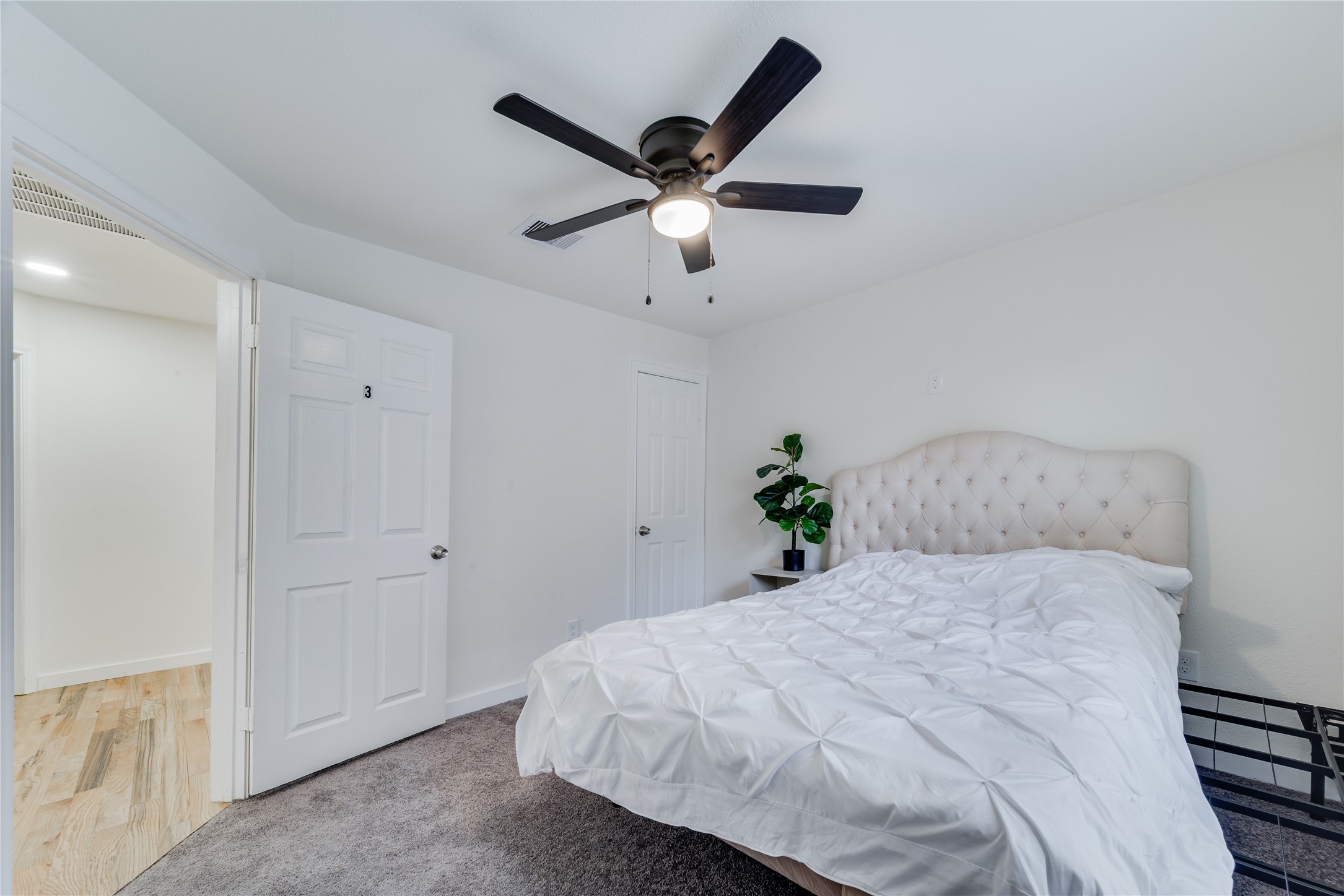 6603 Victoria Street Houston, TX 77020 - Photo 20 of 34 a bedroom with a bed and window