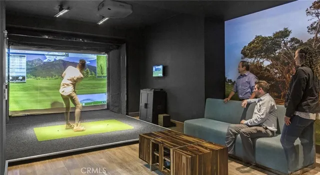 a room with furniture and a flat screen tv