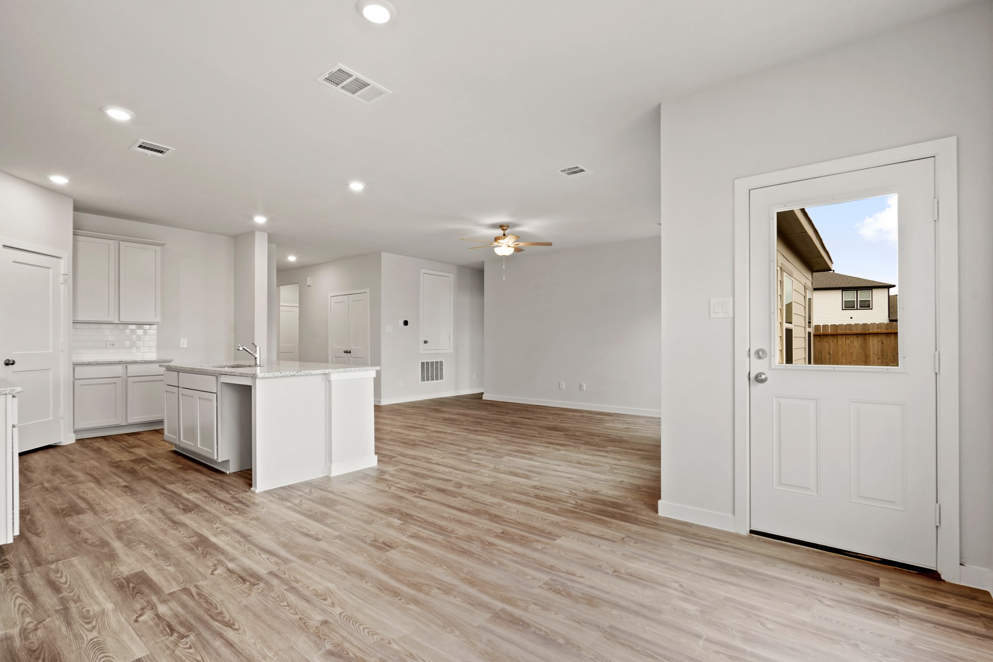 11679 Wilgers Way Willis, TX 77378 - Photo 7 of 27 a view of kitchen with wooden floor