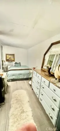 a view of washer and dryer with kitchen view