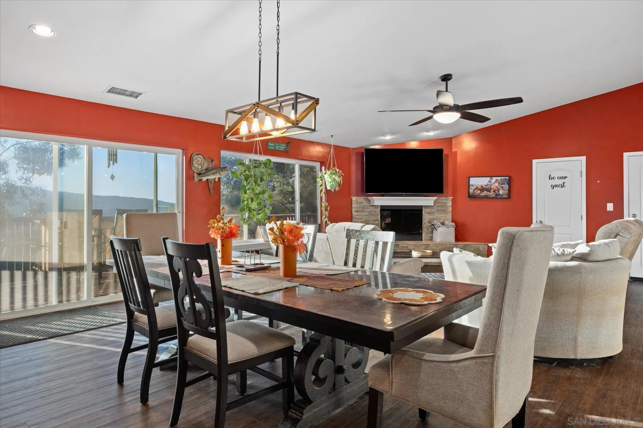 1714 Foss Road Alpine, CA 91901 - Photo 14 of 66 a view of a dining room with furniture wooden floor and chandelier