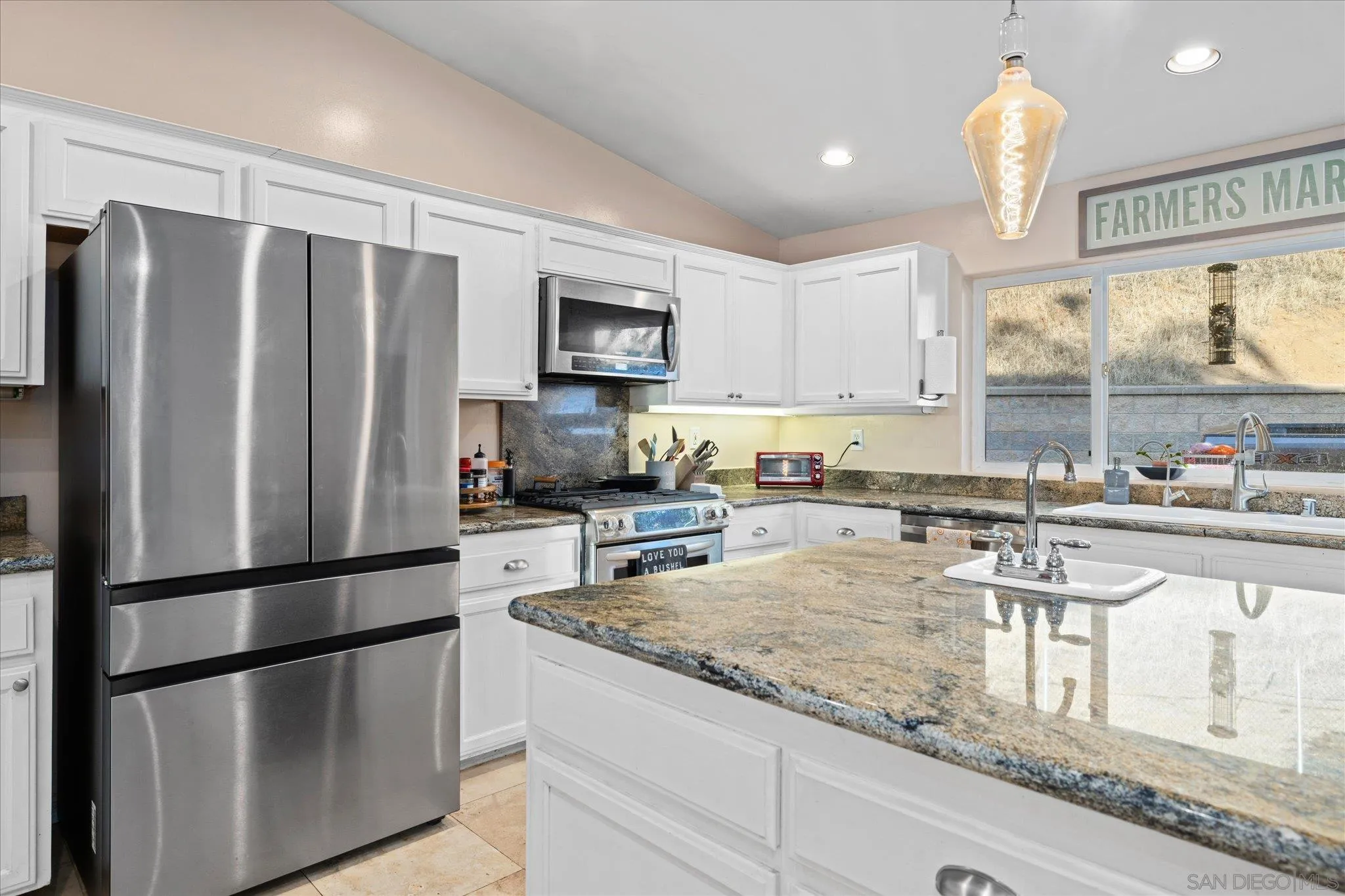 1714 Foss Road Alpine, CA 91901 - Photo 19 of 66 a kitchen with stainless steel appliances granite countertop a refrigerator a stove a sink and a granite counter tops