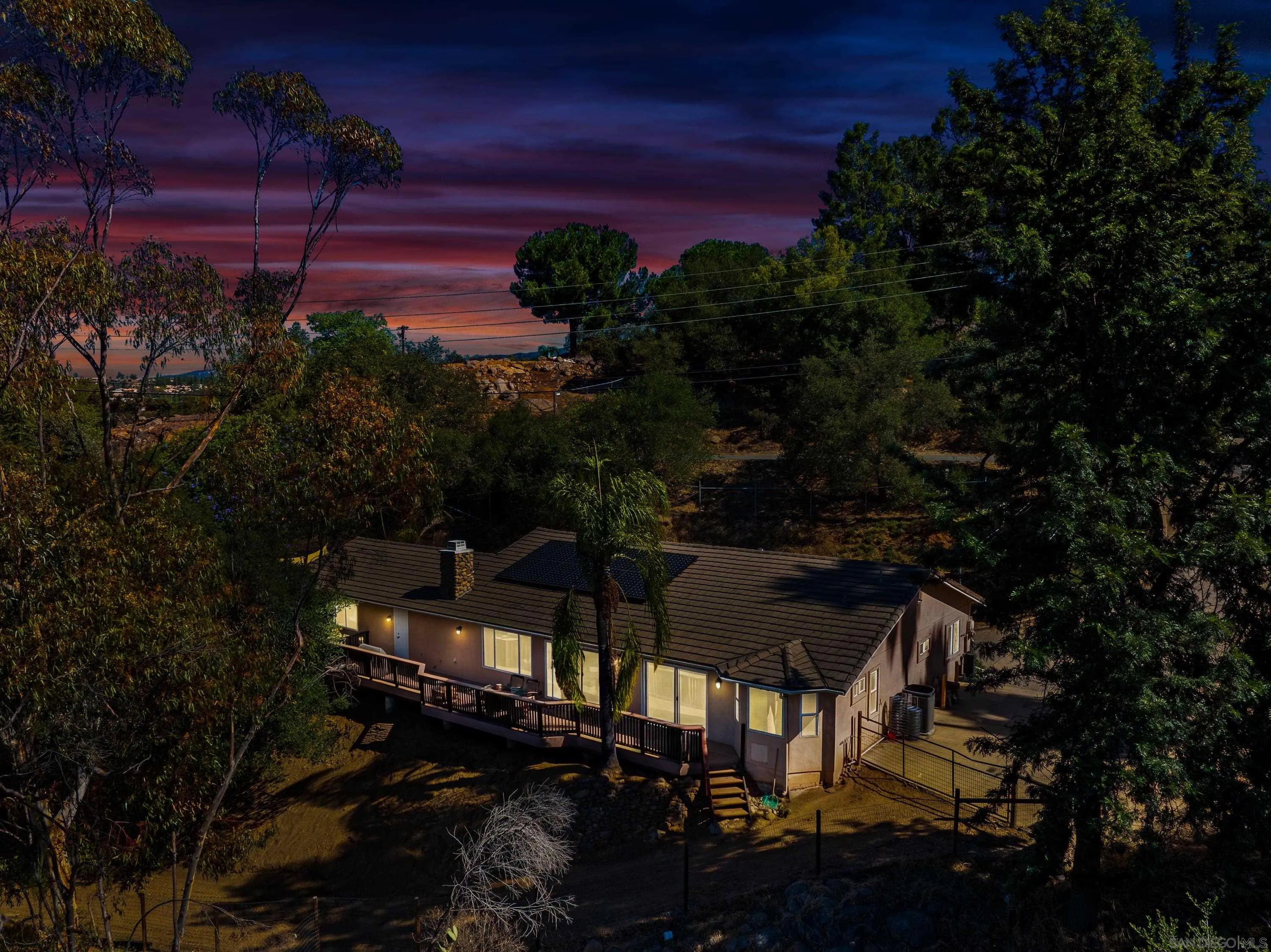 1714 Foss Road Alpine, CA 91901 - Photo 3 of 66 a view of a chairs and table in backyard