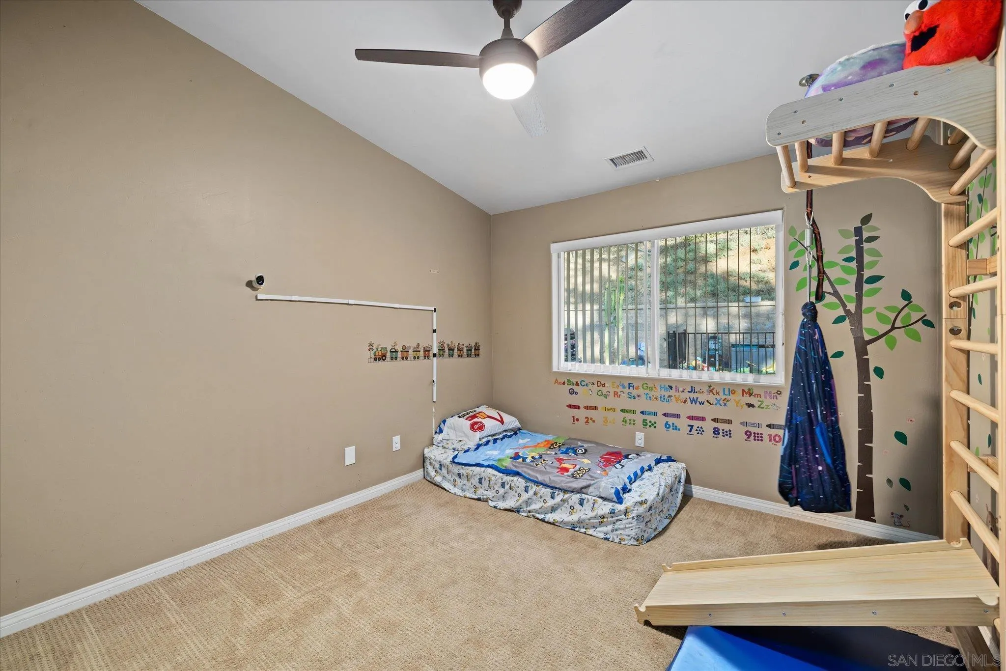 1714 Foss Road Alpine, CA 91901 - Photo 32 of 66 a bedroom with bed and a window