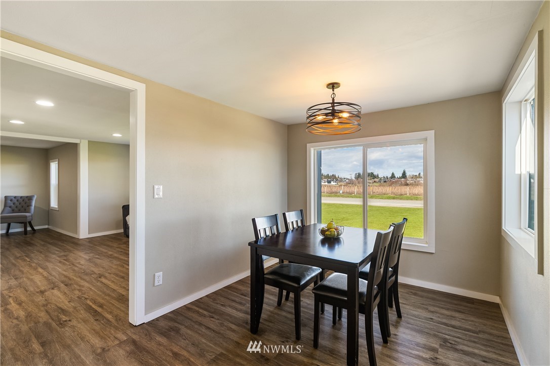 1077 Hampton Road Lynden, WA 98264 - Photo 11 of 25 a view of a dining room with furniture window and outside view
