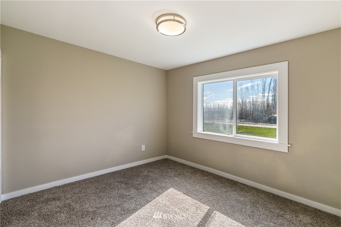 1077 Hampton Road Lynden, WA 98264 - Photo 14 of 25 an empty room with a window