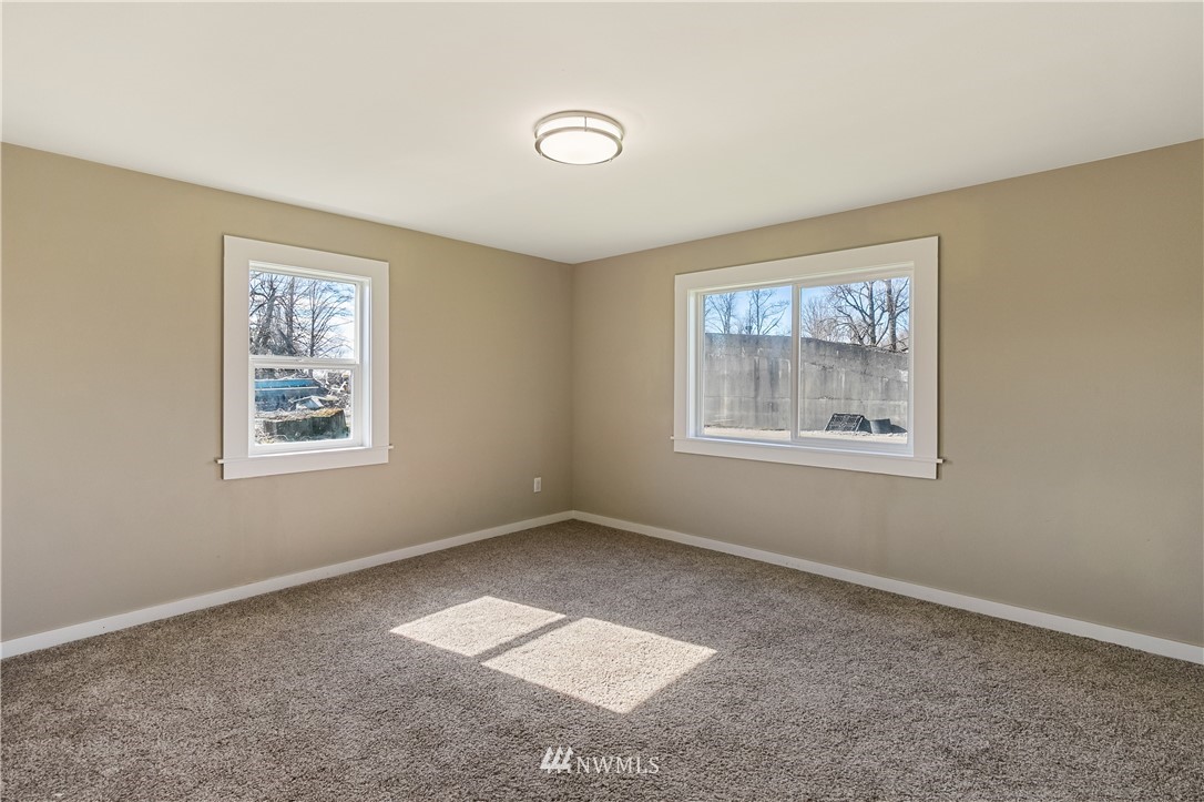 1077 Hampton Road Lynden, WA 98264 - Photo 16 of 25 a view of an empty room with a window