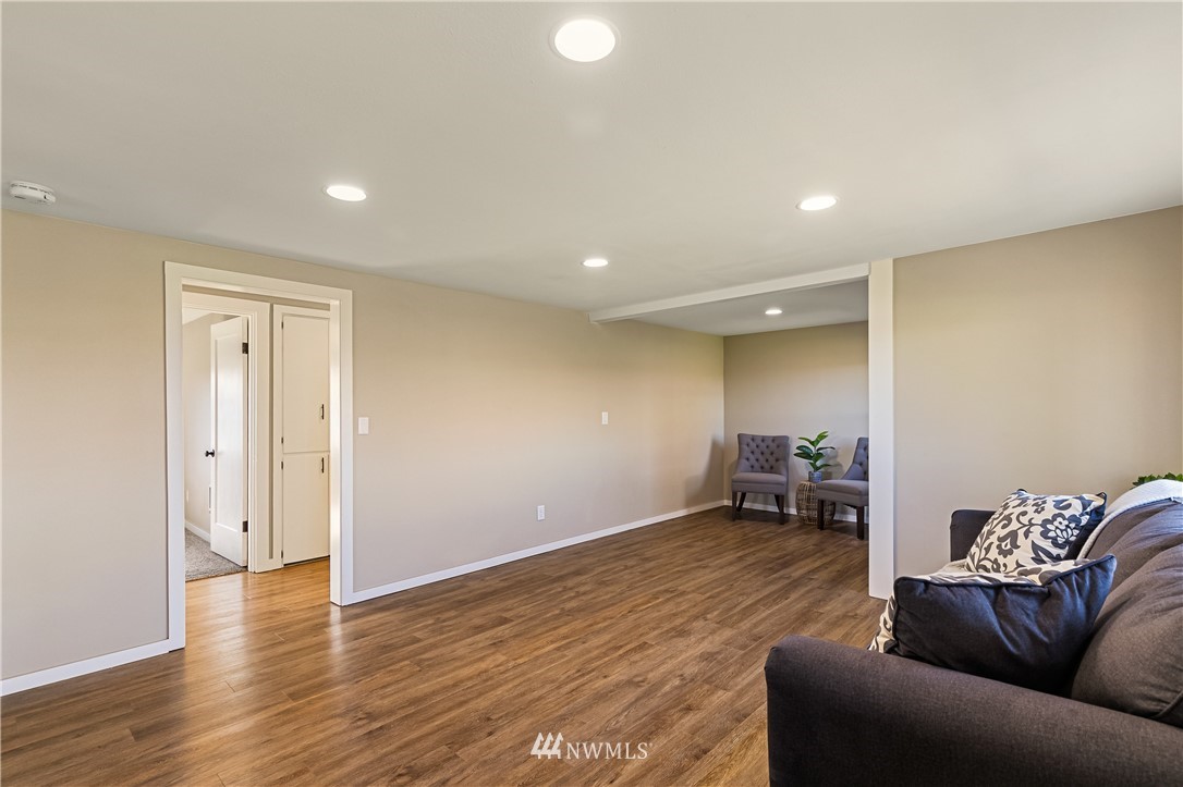 1077 Hampton Road Lynden, WA 98264 - Photo 3 of 25 a living room with furniture and a wooden floor