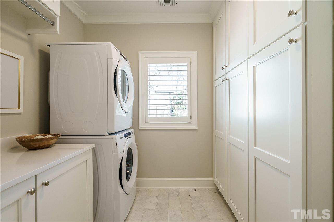 604 Daniels Street, Unit B Raleigh, NC 27605 - Photo 13 of 20 a utility room with dryer and washer
