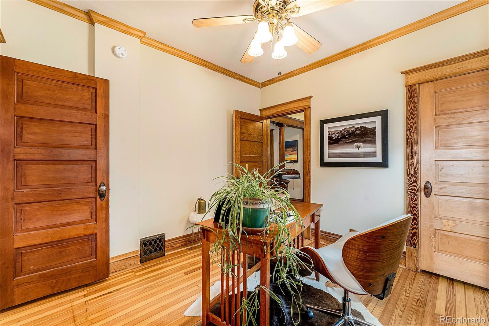 3548 Clay Street Denver, CO 80211 - Photo 14 of 30 a living room with furniture and wooden floor