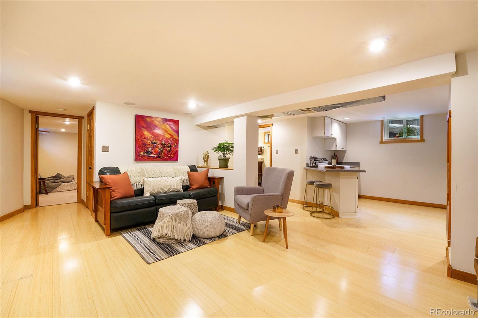 3548 Clay Street Denver, CO 80211 - Photo 20 of 30 a living room with furniture and kitchen view