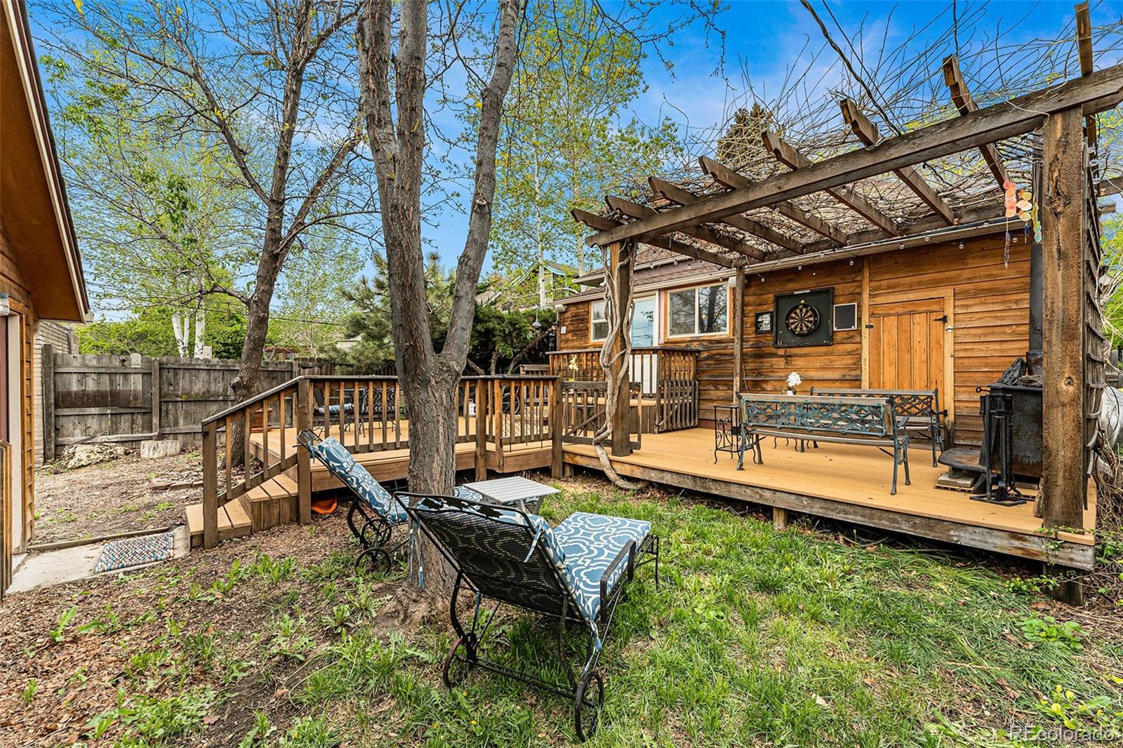 3548 Clay Street Denver, CO 80211 - Photo 30 of 30 a view of a house with a backyard and wooden deck