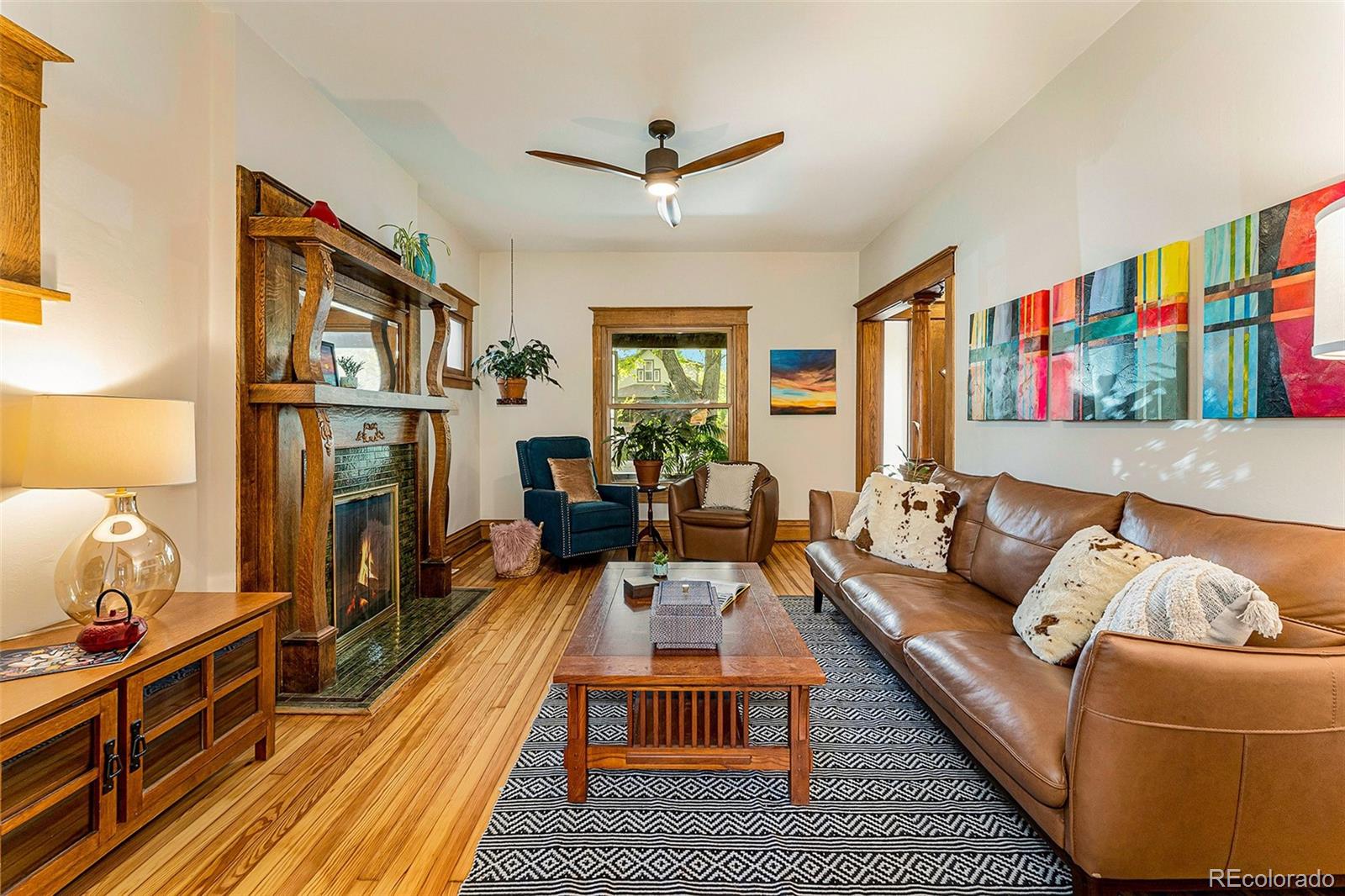 3548 Clay Street Denver, CO 80211 - Photo 4 of 30 a living room with furniture fireplace and a window