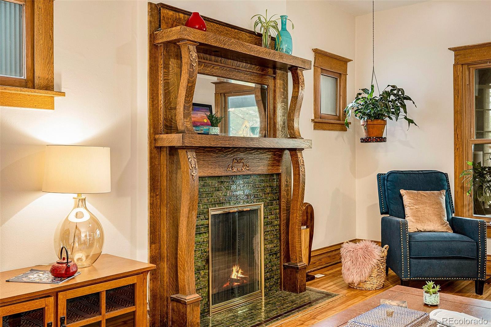 3548 Clay Street Denver, CO 80211 - Photo 5 of 30 a living room with furniture and a fireplace