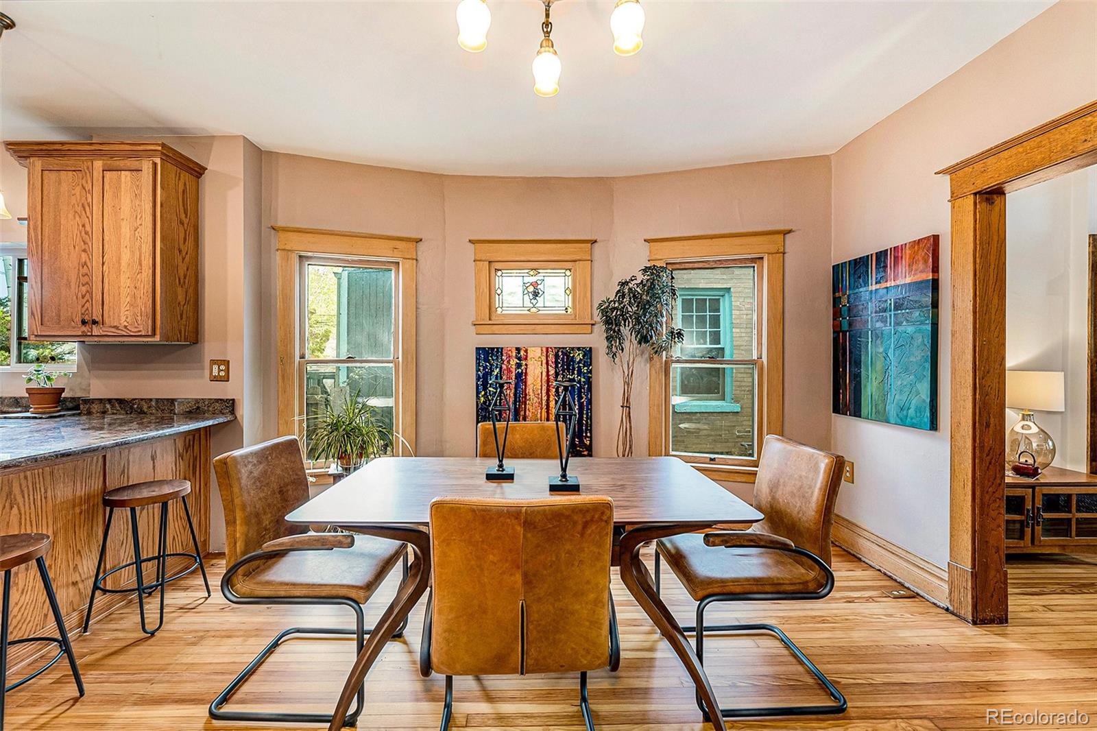3548 Clay Street Denver, CO 80211 - Photo 7 of 30 a living room with fireplace furniture and a large window