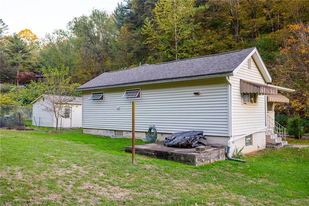 181 Firden Lane Elizabeth, PA 15037 - Photo 17 of 25 a backyard of a house with table and chairs