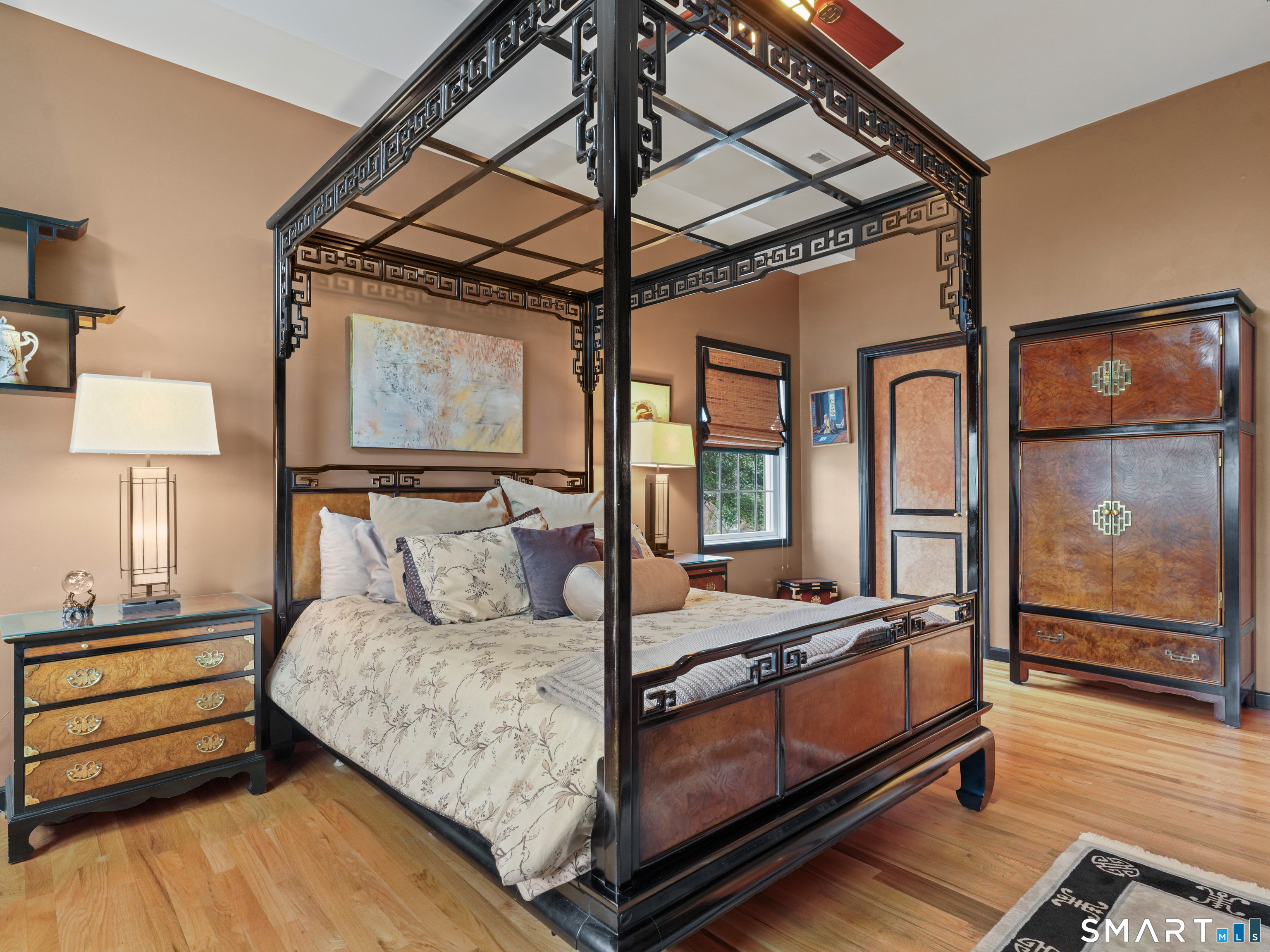 82 Ramapoo Road Ridgefield, CT 06877 - Photo 24 of 40 a bedroom with bed and wooden floor