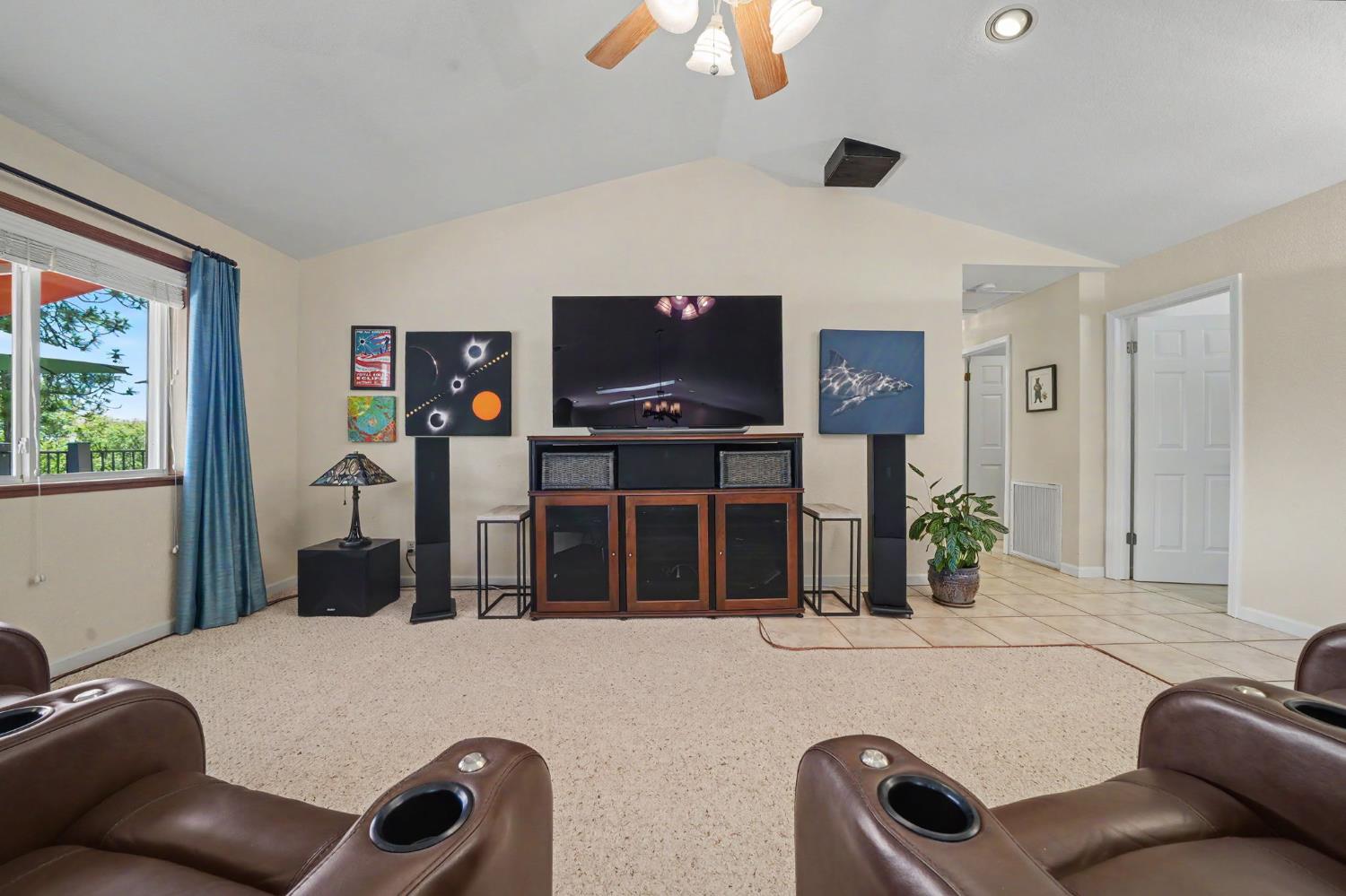 18299 West Clinton Road Jackson, CA 95642 - Photo 34 of 56 a living room with furniture and a flat screen tv