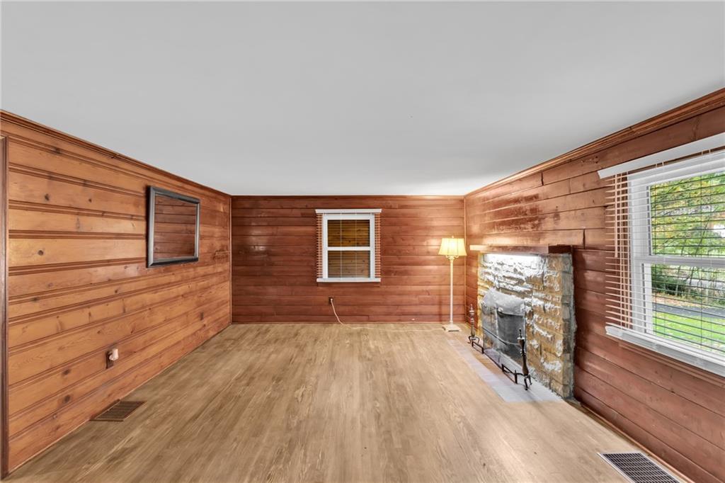 155 Harrold Street Jeannette, PA 15644 - Photo 11 of 37 a view of house with deck and wooden floor