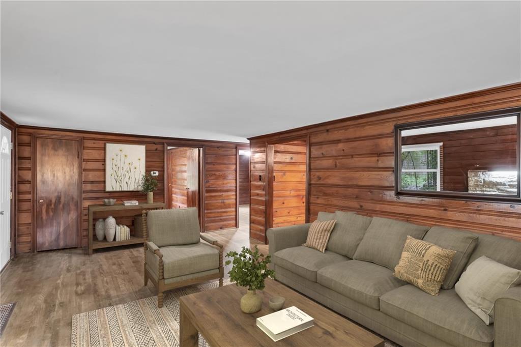 155 Harrold Street Jeannette, PA 15644 - Photo 14 of 37 a living room with furniture and large windows