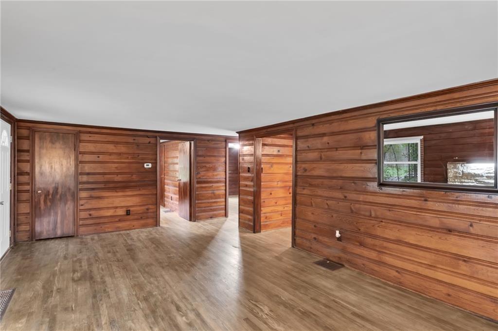 155 Harrold Street Jeannette, PA 15644 - Photo 15 of 37 wooden floor and chair in a room