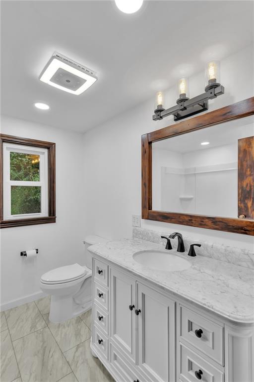 155 Harrold Street Jeannette, PA 15644 - Photo 23 of 37 a bathroom with a granite countertop sink mirror and toilet